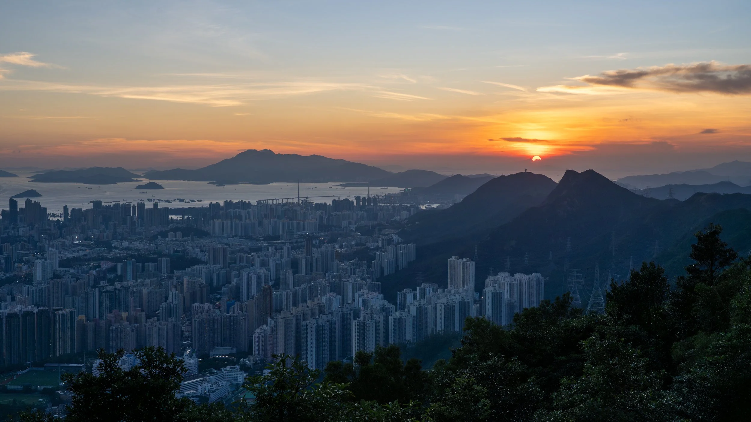 View from Kowloon Peak view point as the sun sets.