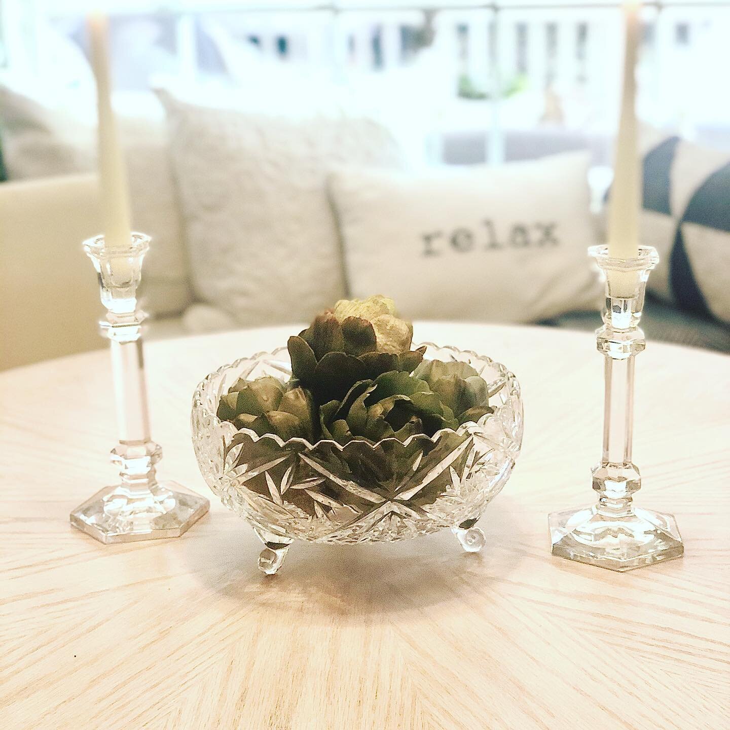 Do you have crystal bowls and candle sticks in your home that may have been gifts from years ago . . . or something that your parents had?
Relax! Use these items in your decor! I think these artichokes look beautiful in this crystal bowl, don&rsquo;t