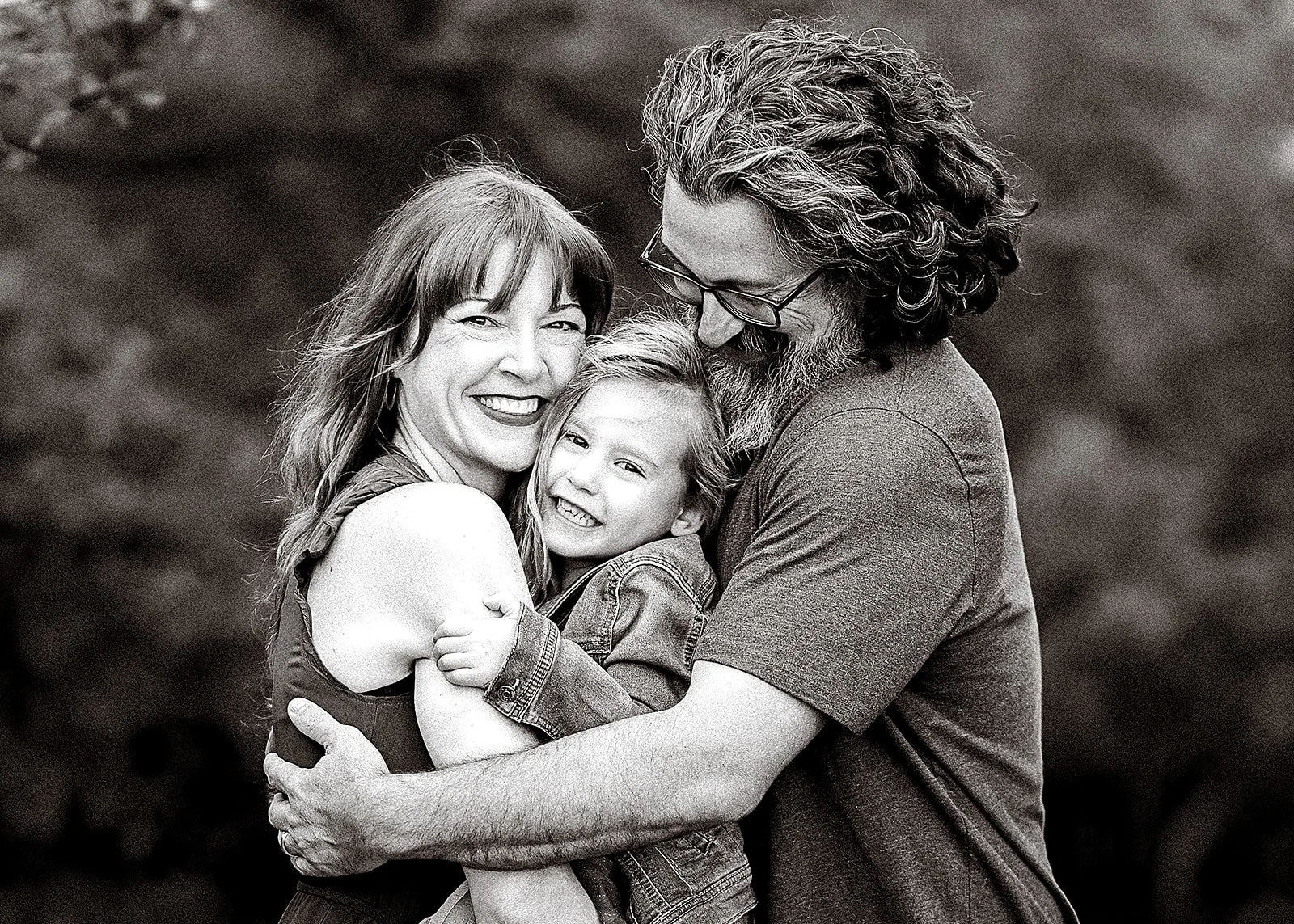 Family hugging in B&W photos