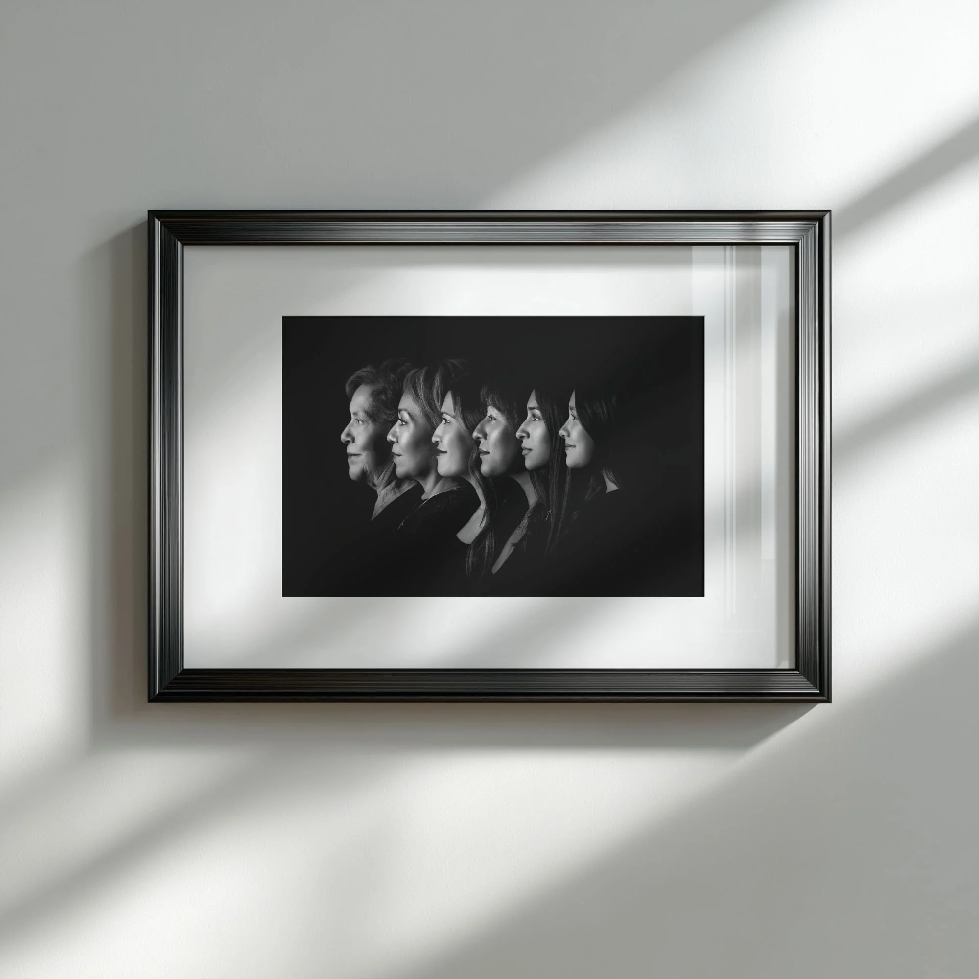 black and white multi generational silhouette portrait of women