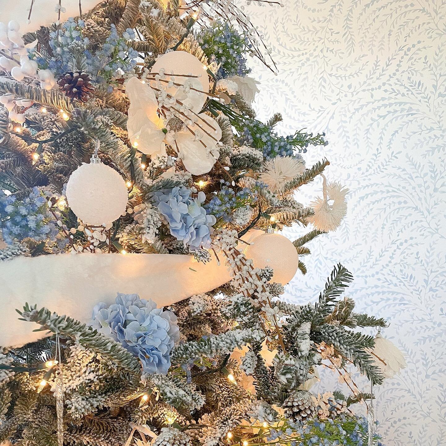 Adding blue this year to the tree to coordinate with my @serenaandlily wallpaper ! Im loving it! Still need to add some finishing touches but its coming along!  My husband was teasing me and said &quot; nothing says Christmas like light blue &quot; ?