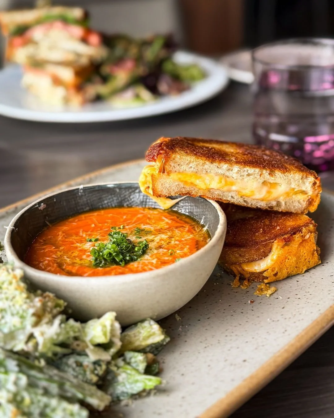 Cold day vibes. Grilled Cheese and Tomato Bisque to the rescue🧀 🍅 

French mimolette, @cheese_boutique Ripley gouda, and aged provolone on house-made sourdough. Served with tomato bisque and your choice of side. 

NEW to our lunch menu.