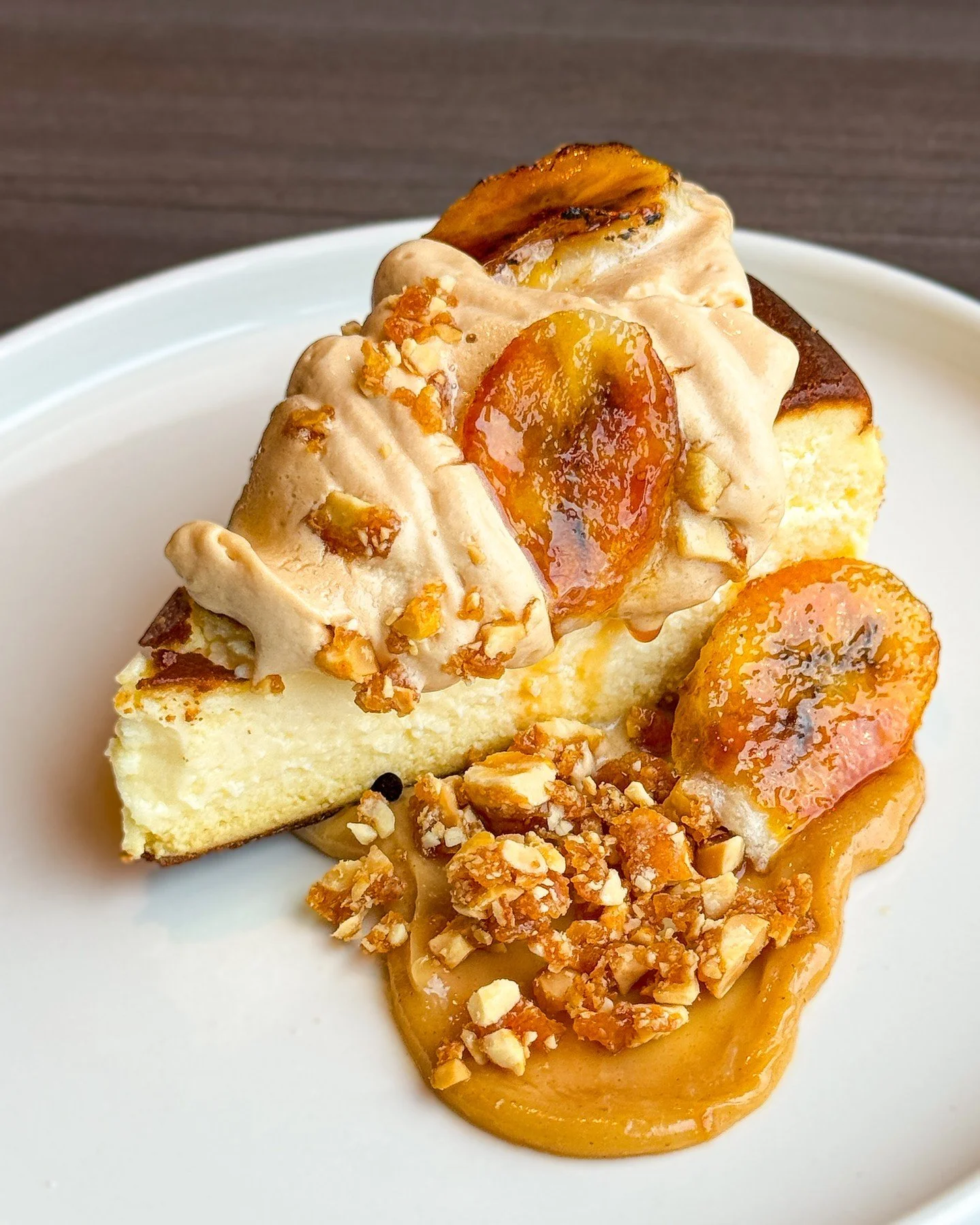 Start the weekend off on the sweet side✨

BASQUE CHEESECAKE
caramelized banana, whipped caramel cream, and peanut cr&eacute;meaux
