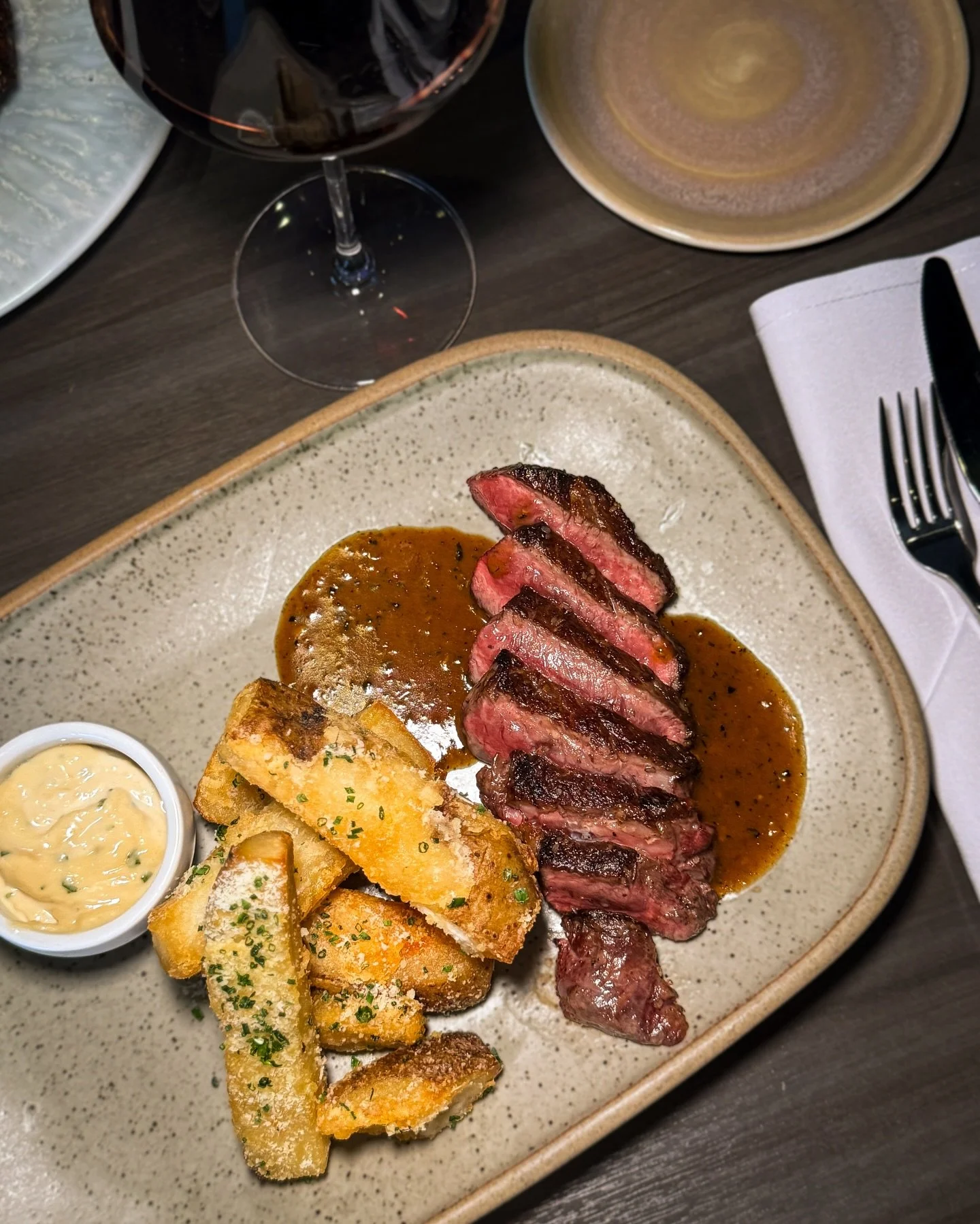 This one needs no introduction✨STEAK FRITES✨Australian Waygu, parm frites, truffle aioli, au poivre sauce.