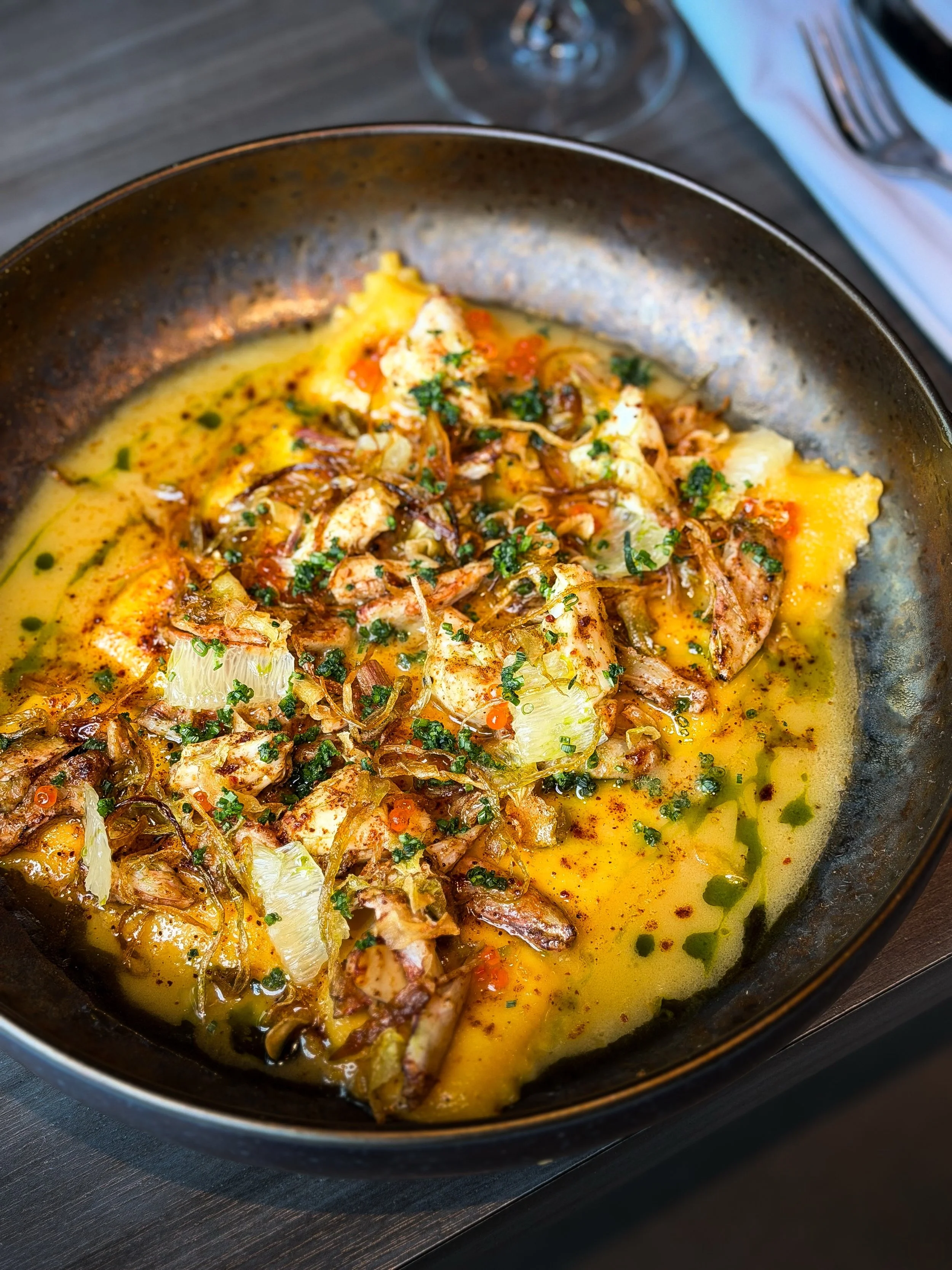 in our ravioli era🤩

blue lump crab, dill oil, dashi beurre blanc, yuzu juice, garlic chips, trout caviar, pecorino, crispy shallots