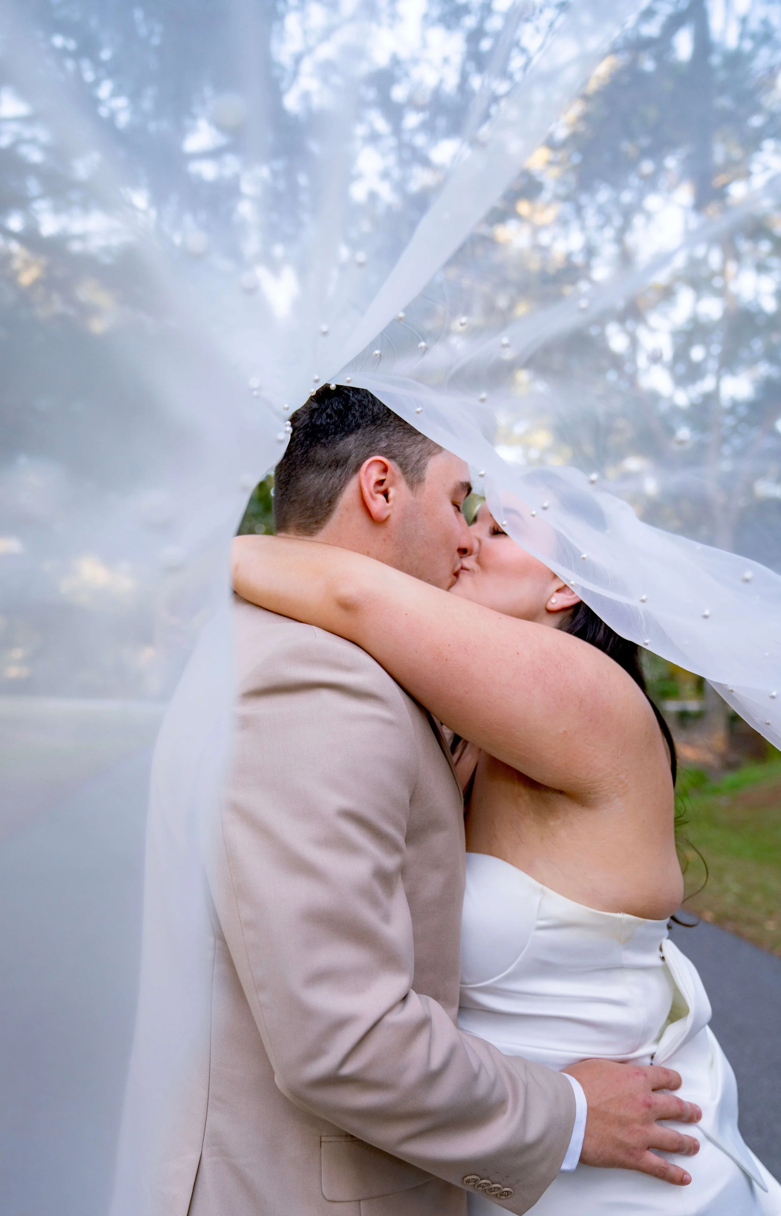 Bride and Groom kissing at a wedding in Hilton Head