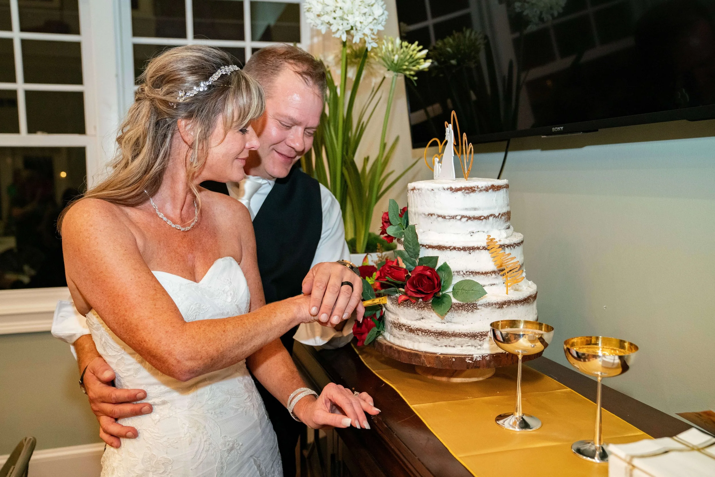 cutting of the cake at a wedding in Bluffton
