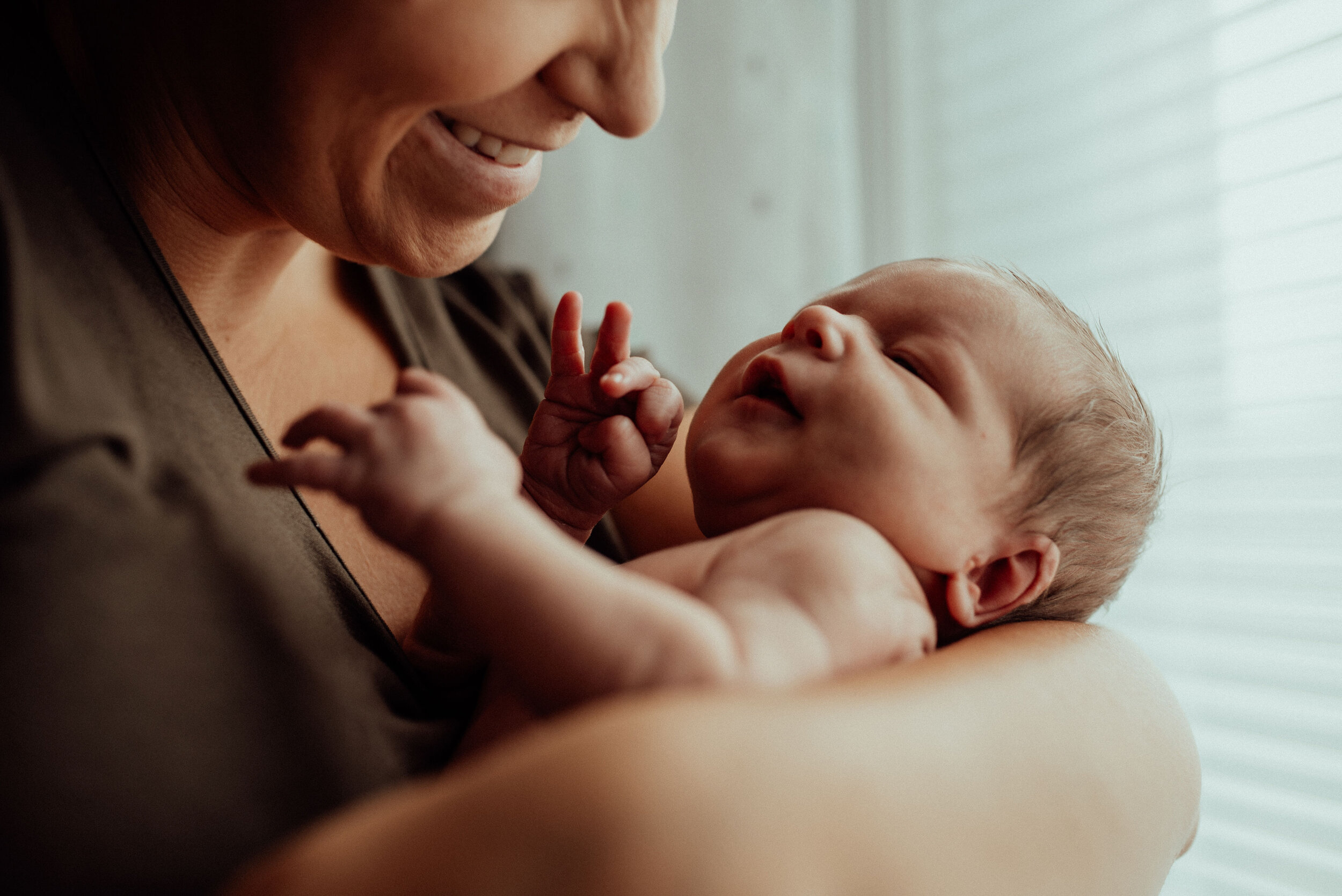 Doula Tiffany Lentell with a client during a birth support session in Des Moines