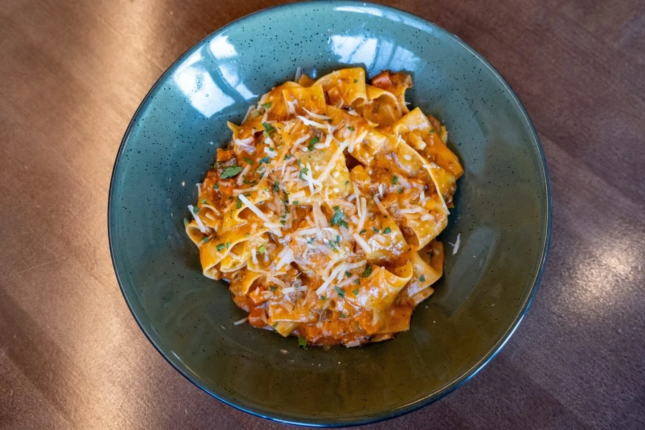 Slow-braised, hand-twirled, cheese-topped perfection. This is THE #PastaDay plate.