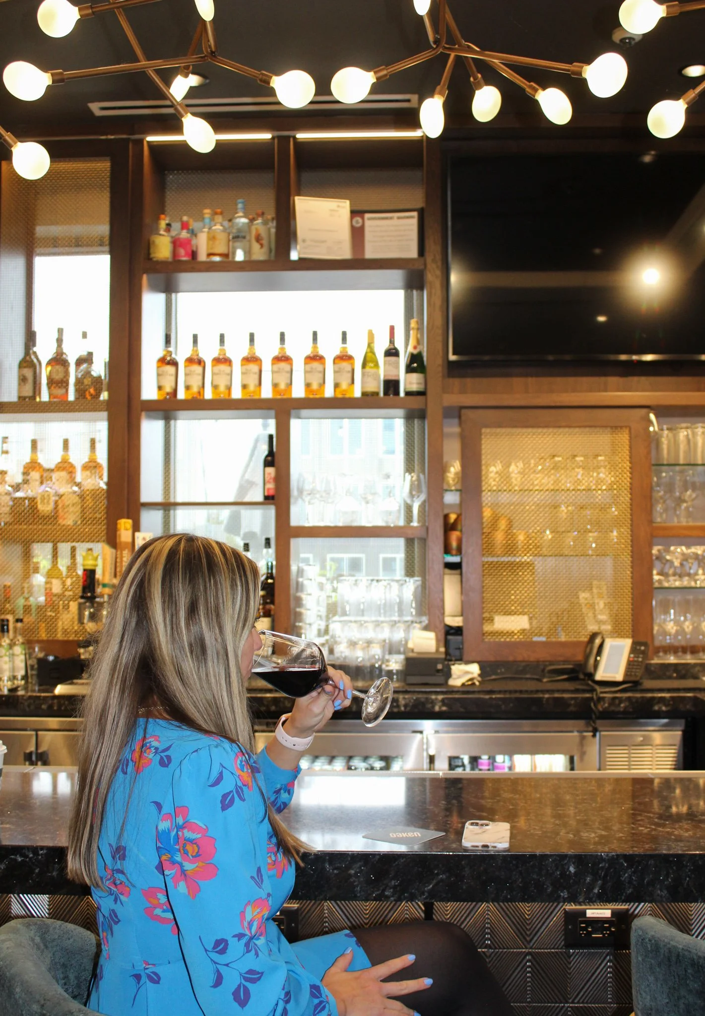 A glass of red and nowhere to be... just how we like it.