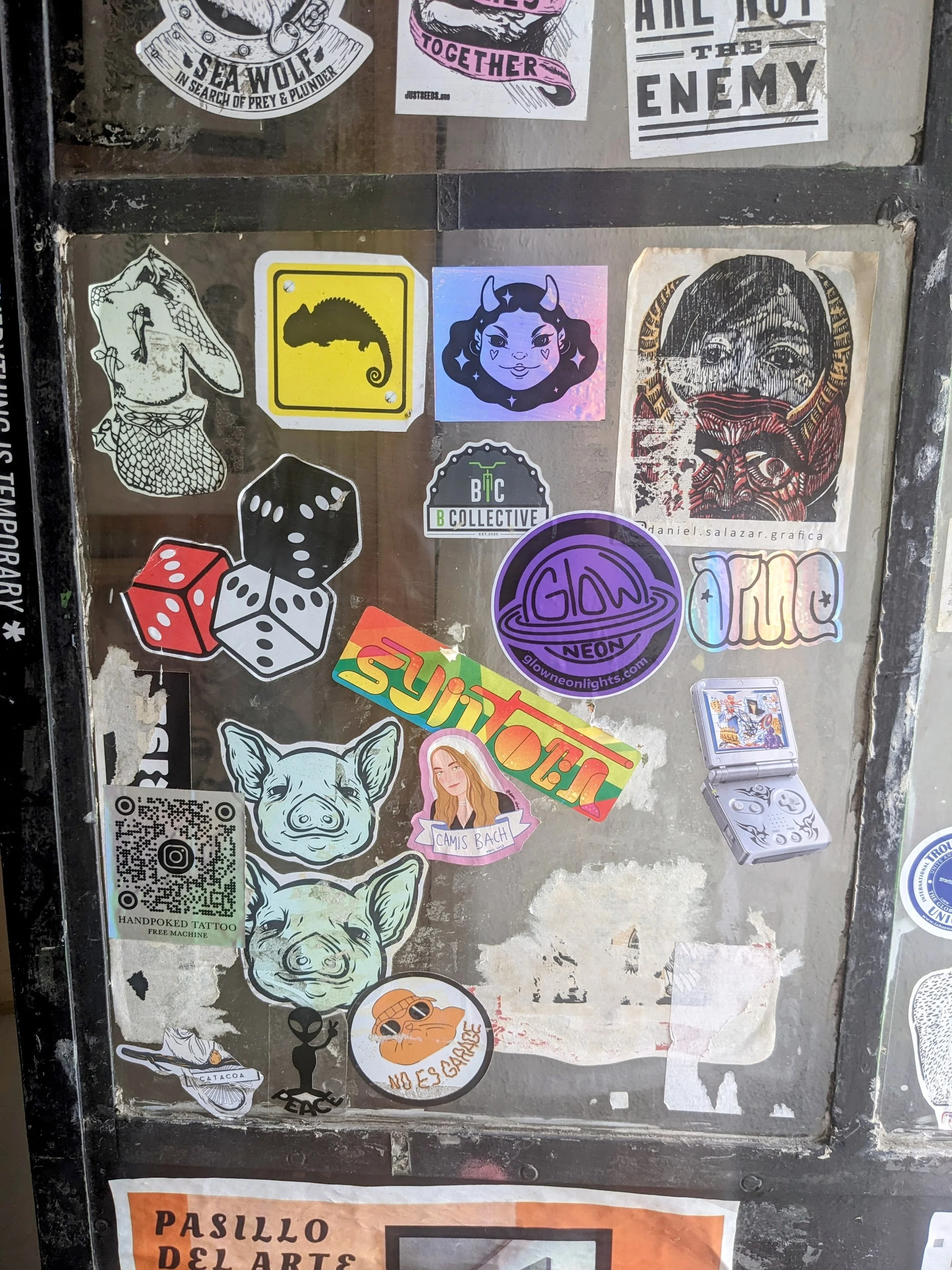 Added my sticker to a wall in Oaxaca
