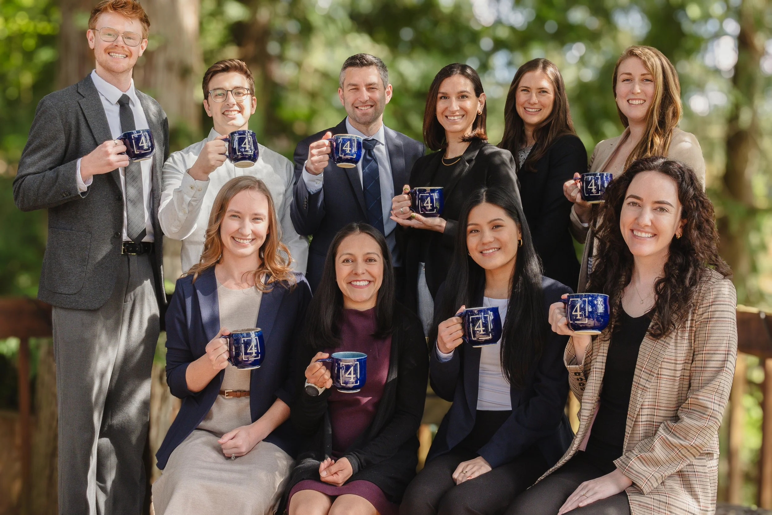 Team Photo with 4C Mugs