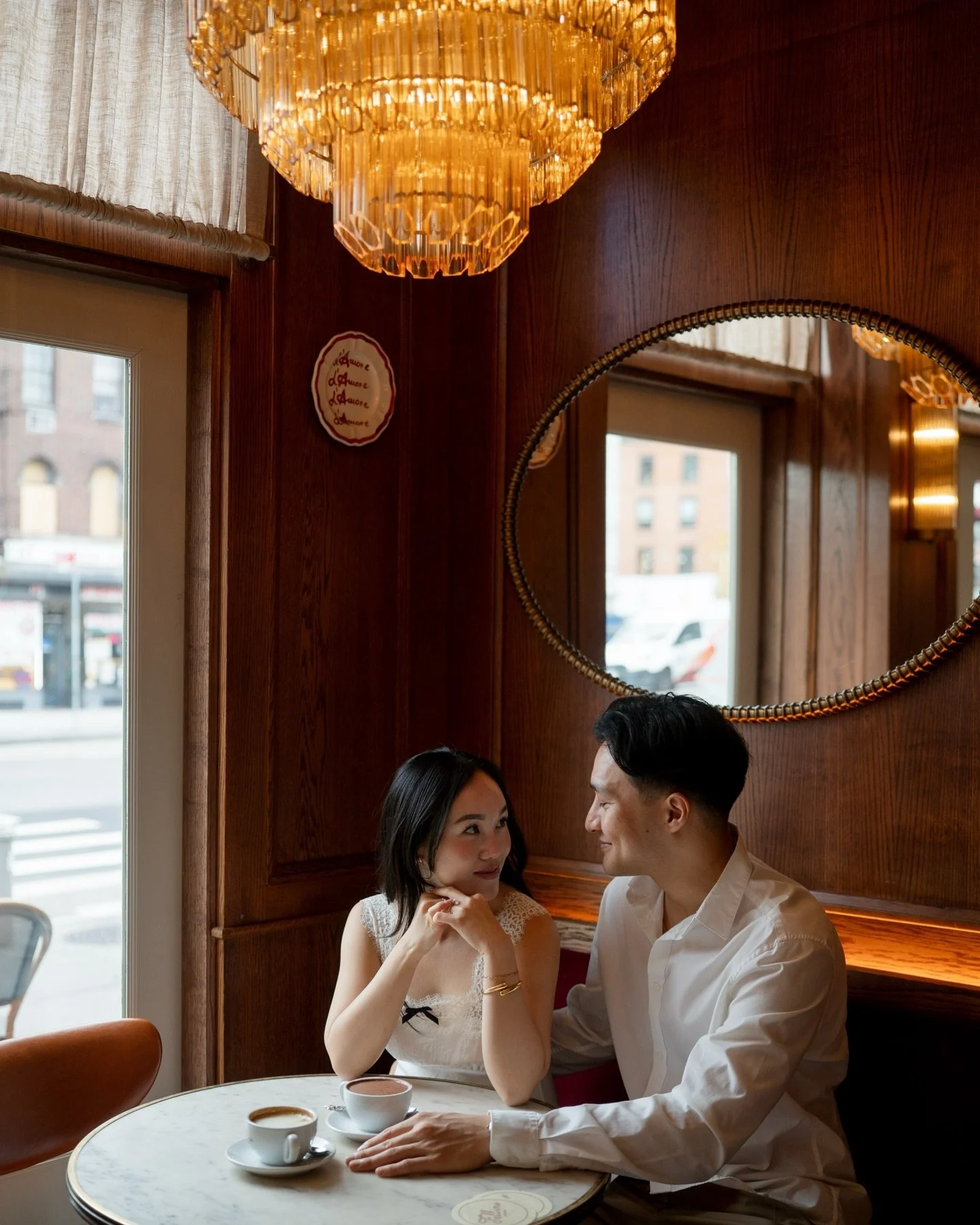 Viana &amp; Alec ☕️💍

We kicked off Viana and Alec&rsquo;s NYC engagement session at Fellini&rsquo;s, a beloved West Village spot, where they warmed up with hot chocolate before heading outside. Starting an engagement session indoors&mdash;especiall