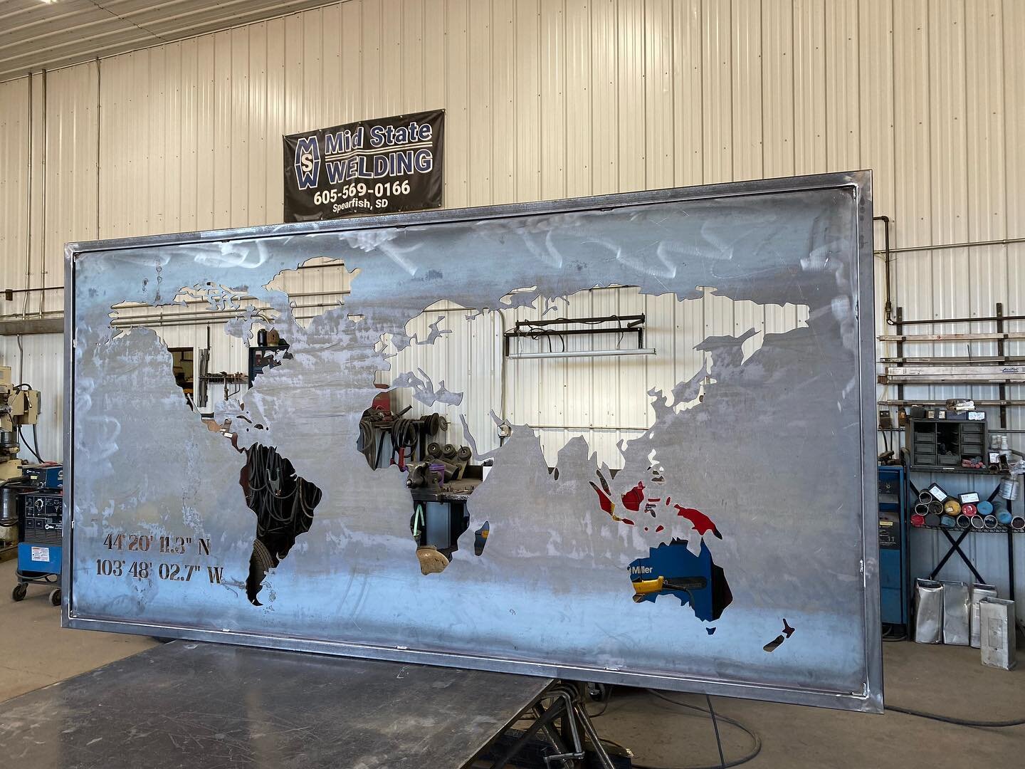 The Map of the world we framed out for Cappie @pangeadesigngroup and to see the map installed in the home is awesome! How cool would it be to have something like this in your home?? #midstatewelding #mapoftheworld #myspearfish #pangeadesigns #customf