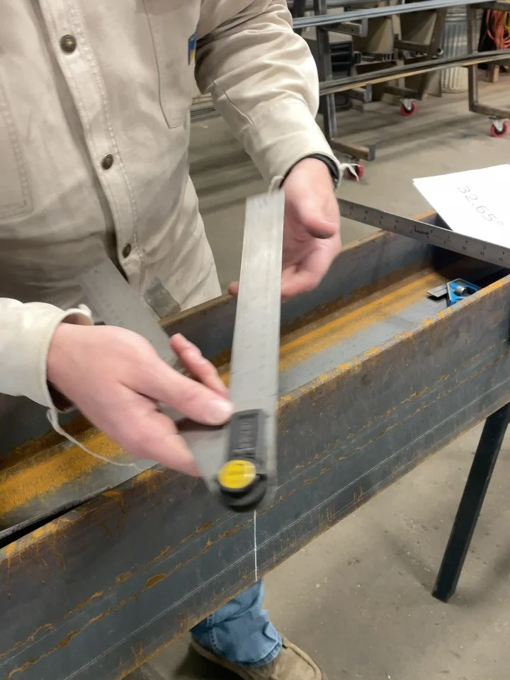 Laying out the bottom of this floating staircase I-beam&mdash;here&rsquo;s a trick that saves a ton of time.

My angle finder isn&rsquo;t long enough to reach across the web of the I-beam, so I grab a straight edge to keep my marks accurate. Then, wh