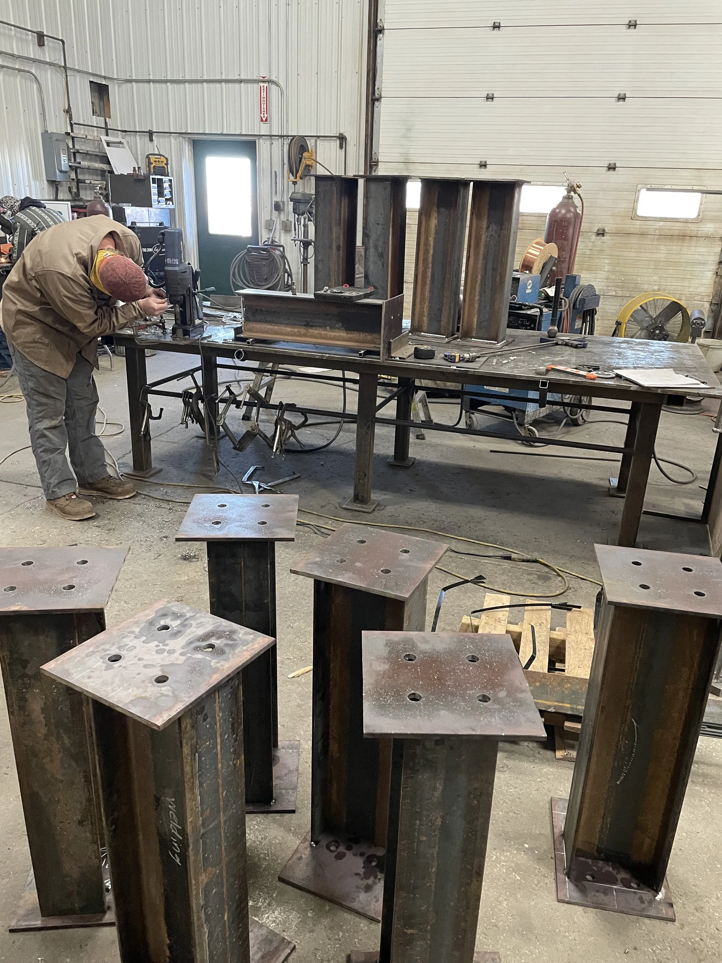 Mid State Welding crew installing ranch pipe fence near Belle Fourche South Dakota