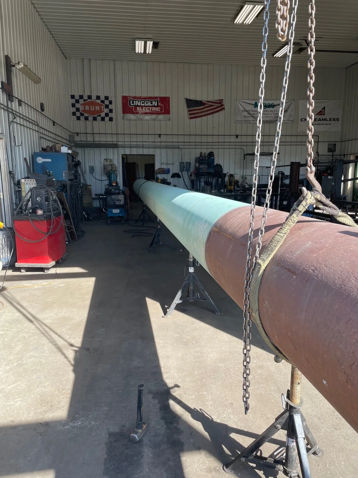 Overhead entrance beam pipe in the Mid State Welding shop