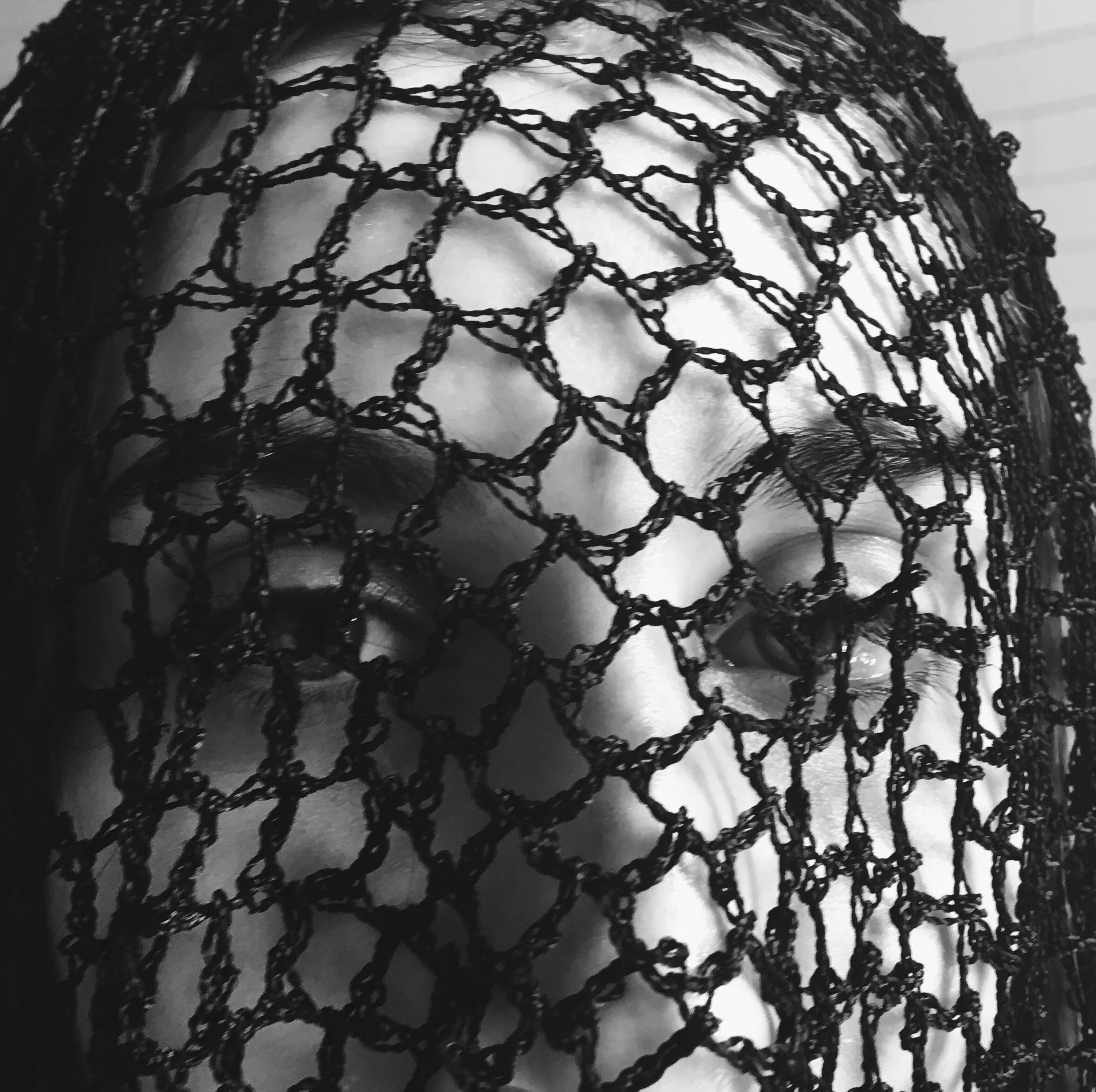 M photo- fishnet face 10:17.JPG