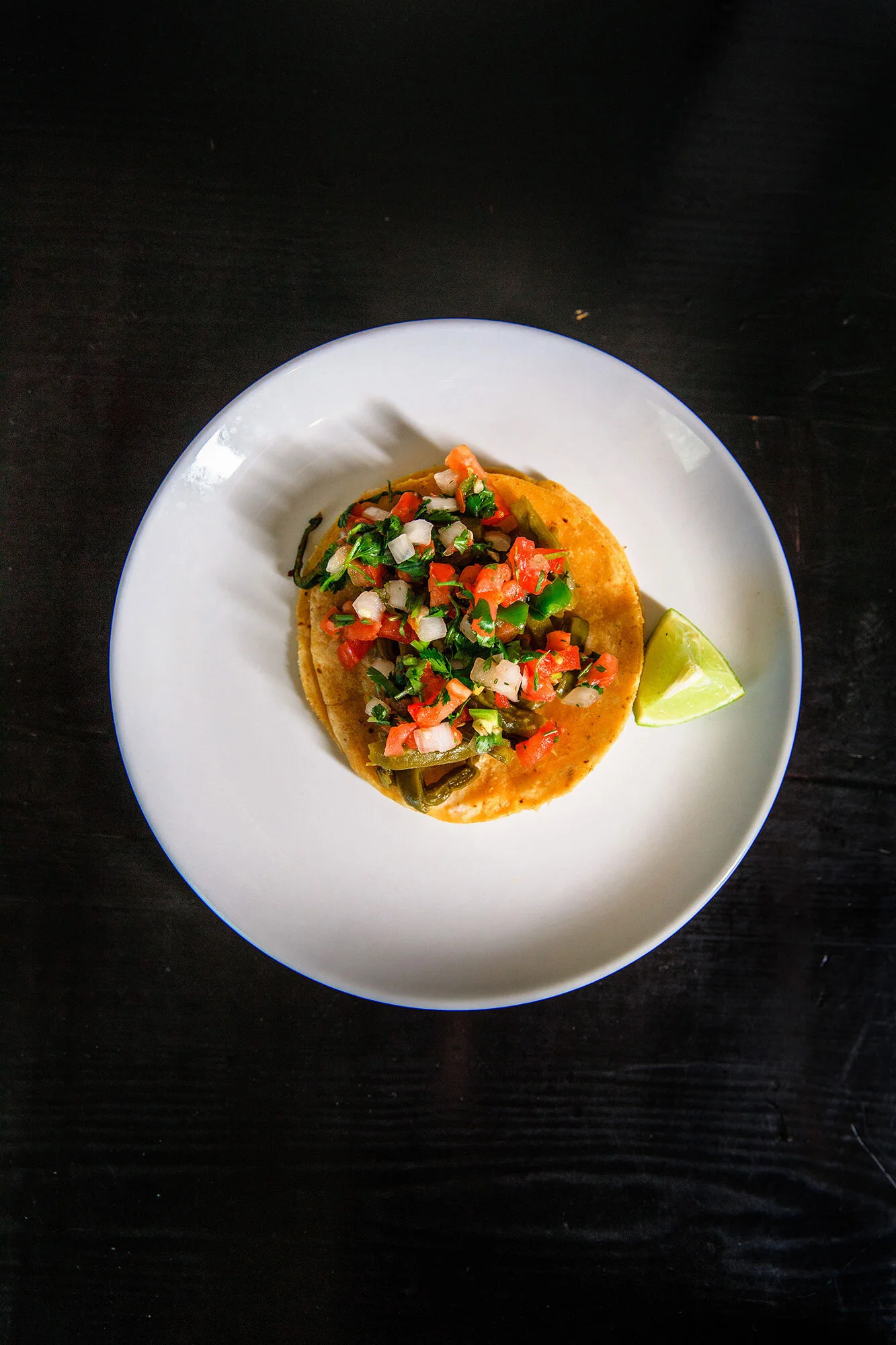 Nopalitos (GF/VG). Cactus plant saut&eacute;ed with onions/topped with pico de gallo