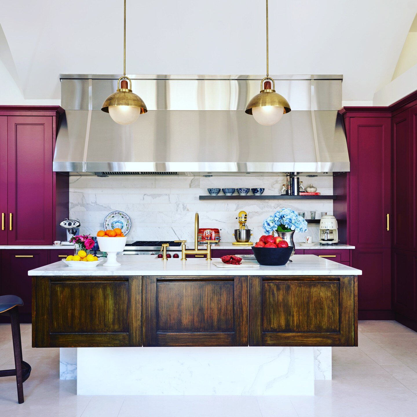 What&rsquo;s cooking in your kitchen this weekend?

Our clients&rsquo; kitchen, formerly a drab green-grey, was transformed and enlivened with a custom purple-red satin and walnut faux finish by the talented @jameshoback. Faucets and hardware were re