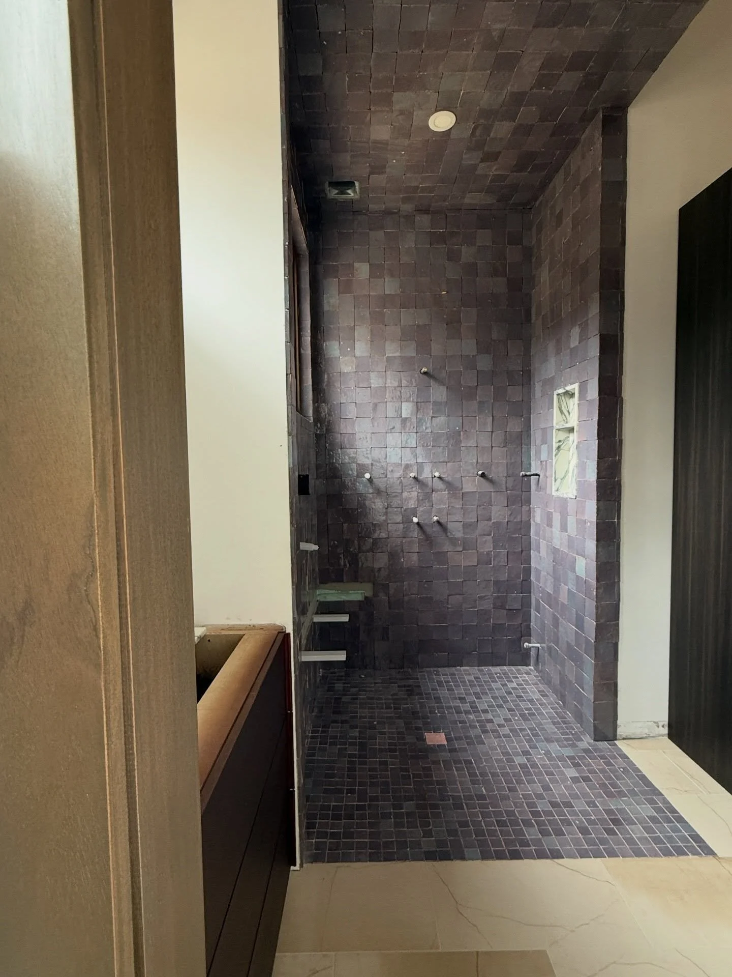 I&rsquo;ve been sharing views of one of a pair of bathrooms we&rsquo;ve been renovating (hers) but I&rsquo;ve been keeping his under wraps. 

We still have a bit to go, but boy that tile install is something else! Received over the weekend were sampl