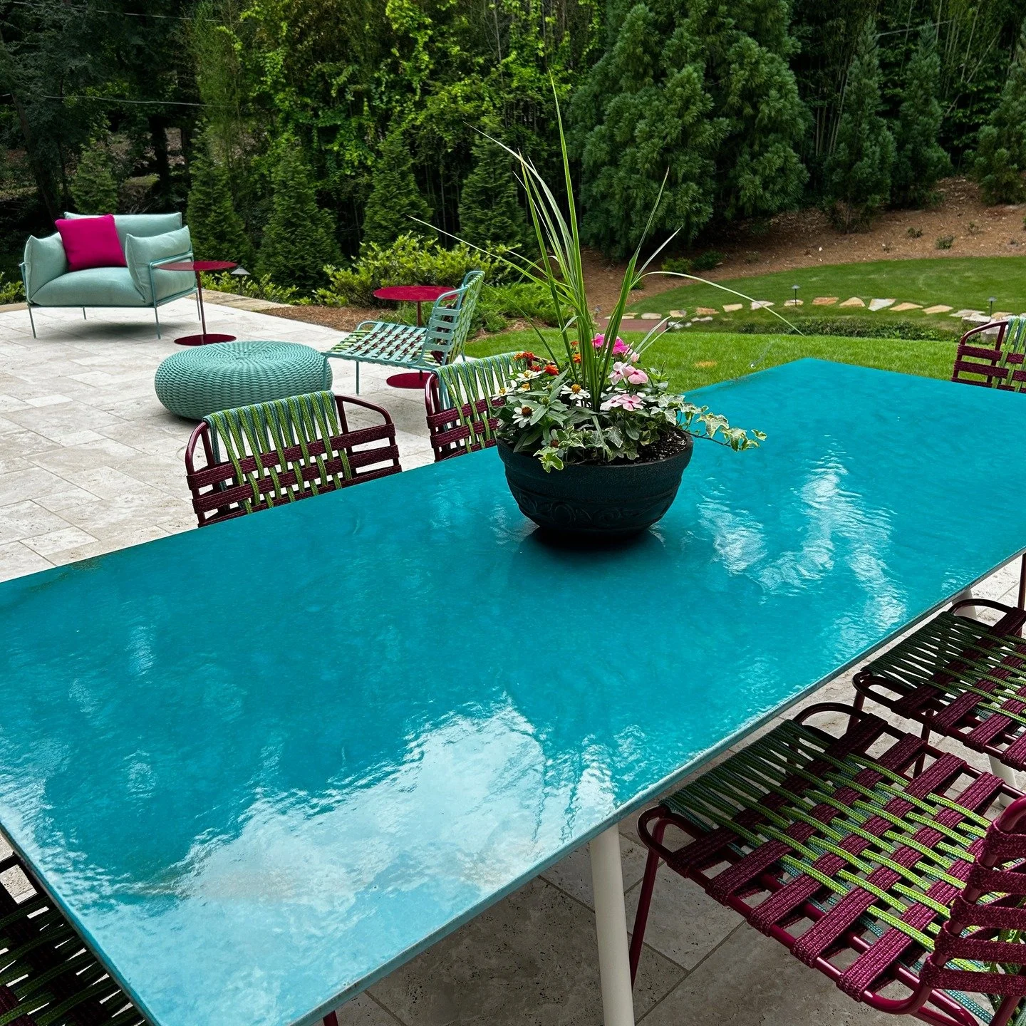 Color is our jam, especially when it's in unexpected places, like these outdoor terraces at our client's Buckhead home, where imparting joy comes in rich blues, fuchsia, purple and lime. With temps in the 90s expected here in Atlanta next weekend, an