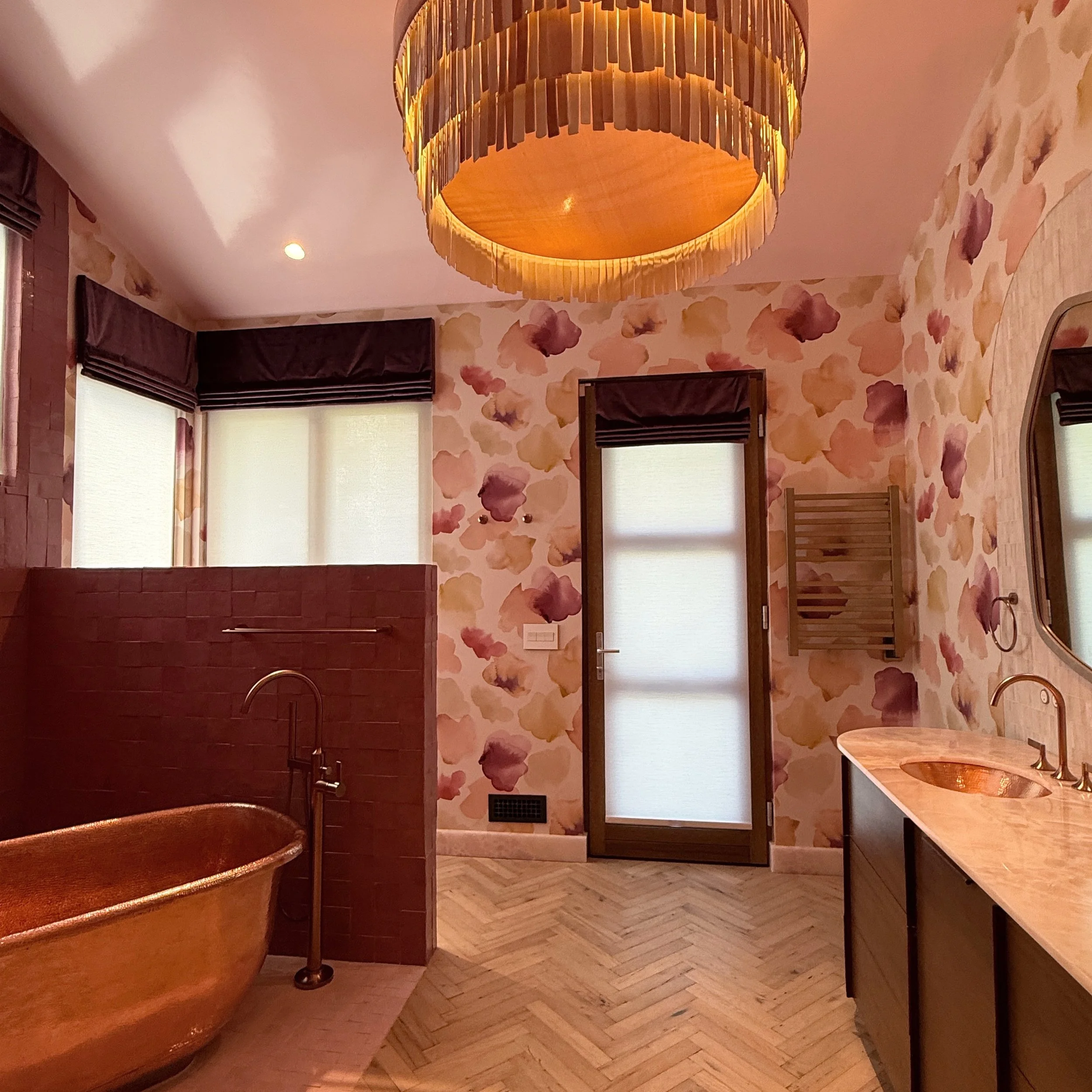 The copper tub is in and it's looking gorgeous! Click on the tags -- it takes a symphony of collaborators (which I guess makes me the conductor) to pull all of the details together, and we're not quite done yet. We've got onyx counters, custom vaniti