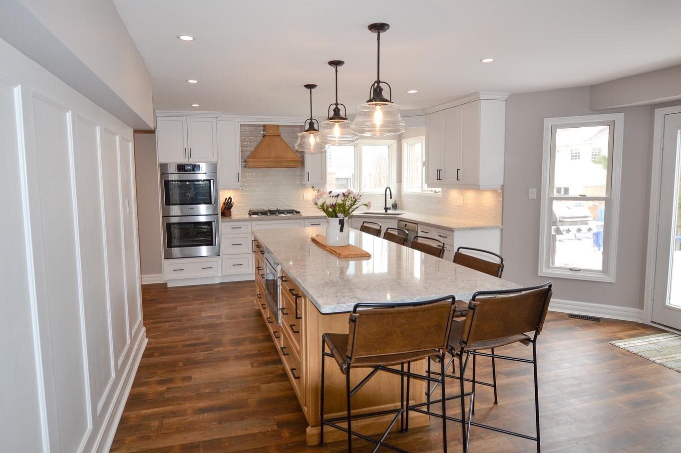 #BEFOREANDAFTER Another beautiful kitchen update by the PM Interiors Team! We took out the wall between the kitchen and dining room to open the space up and extend the kitchen. We made the dining room an extension of the kitchen putting a fridge with