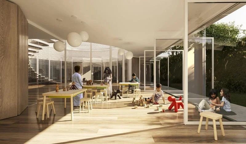 Al Wasl Nursery · UAE — children at tables in the open learning area under the canopy