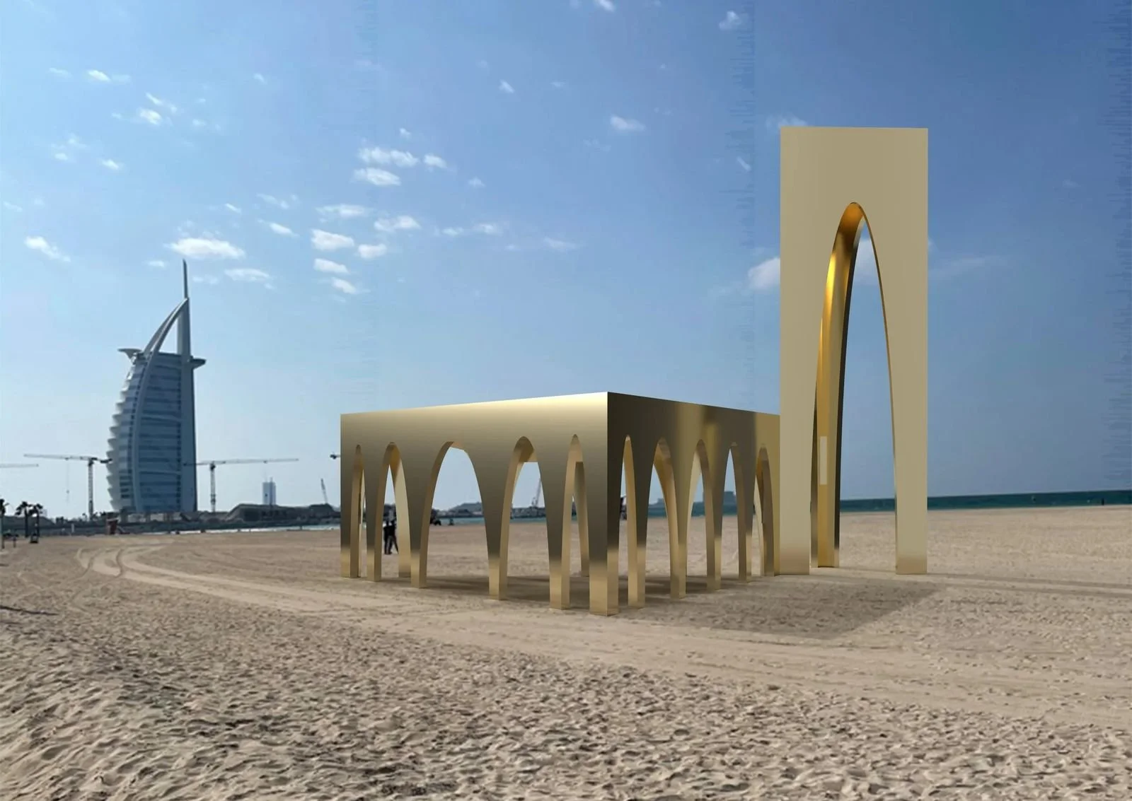 Pop-up Mosque · UAE — the arched frame and minaret standing on the sand