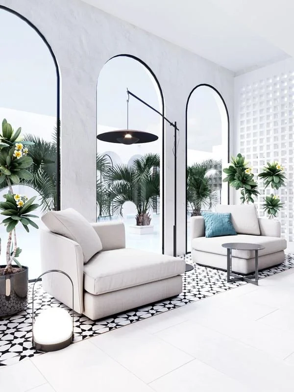Al Ain Farm House · Al Ain — armchair by the arched windows