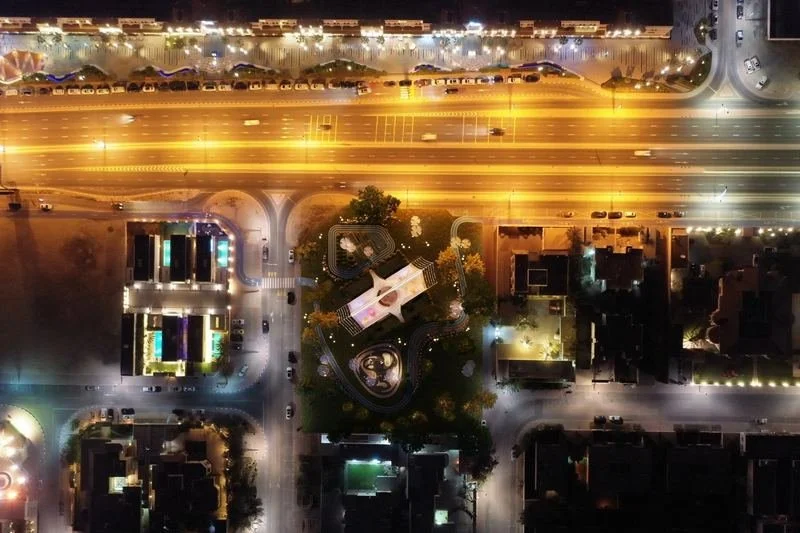 Al Wasl Nursery · UAE — aerial view at night: the nursery beside a lit road