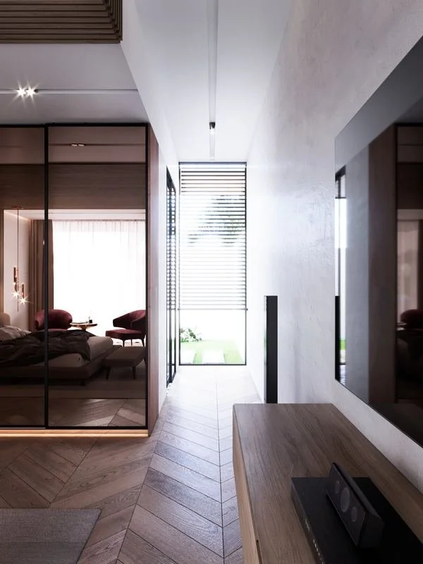 Al Ain Farm House · Al Ain — hallway to a bedroom with timber doors