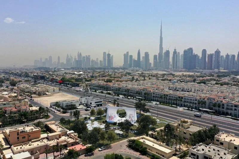 Al Wasl Nursery · UAE — aerial view of the nursery among villas, skyline on the horizon
