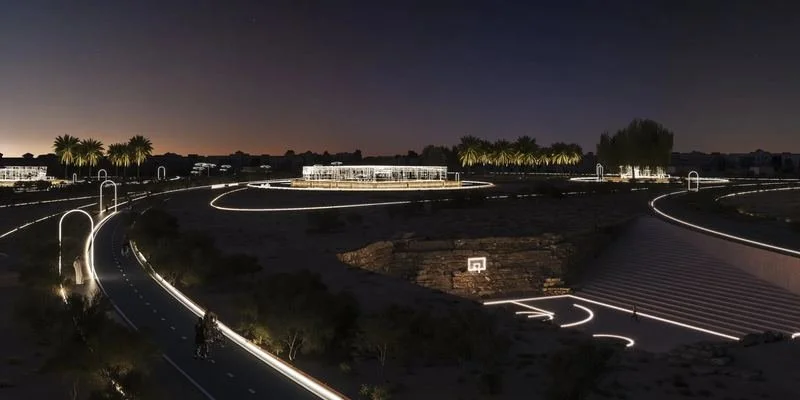 Jumeirah Archaeological Square · Jumeirah — the square lit at dusk, paths curving through it