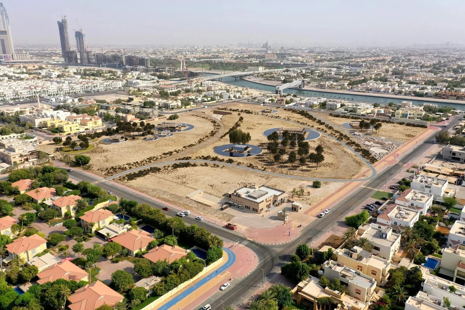 Jumeirah Archaeological Square · Jumeirah — aerial view of the walled archaeological site among houses