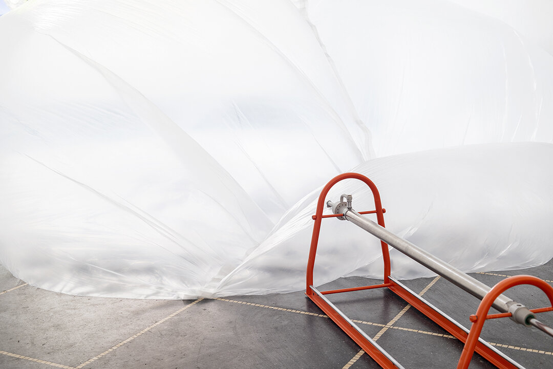 And Now, Up in the Air! (machine part 2/3), 2021, powder coated steel, concrete, pneumatic pump, foil, tape,
dimensions variable, object: 57 x 67 x 371 cm