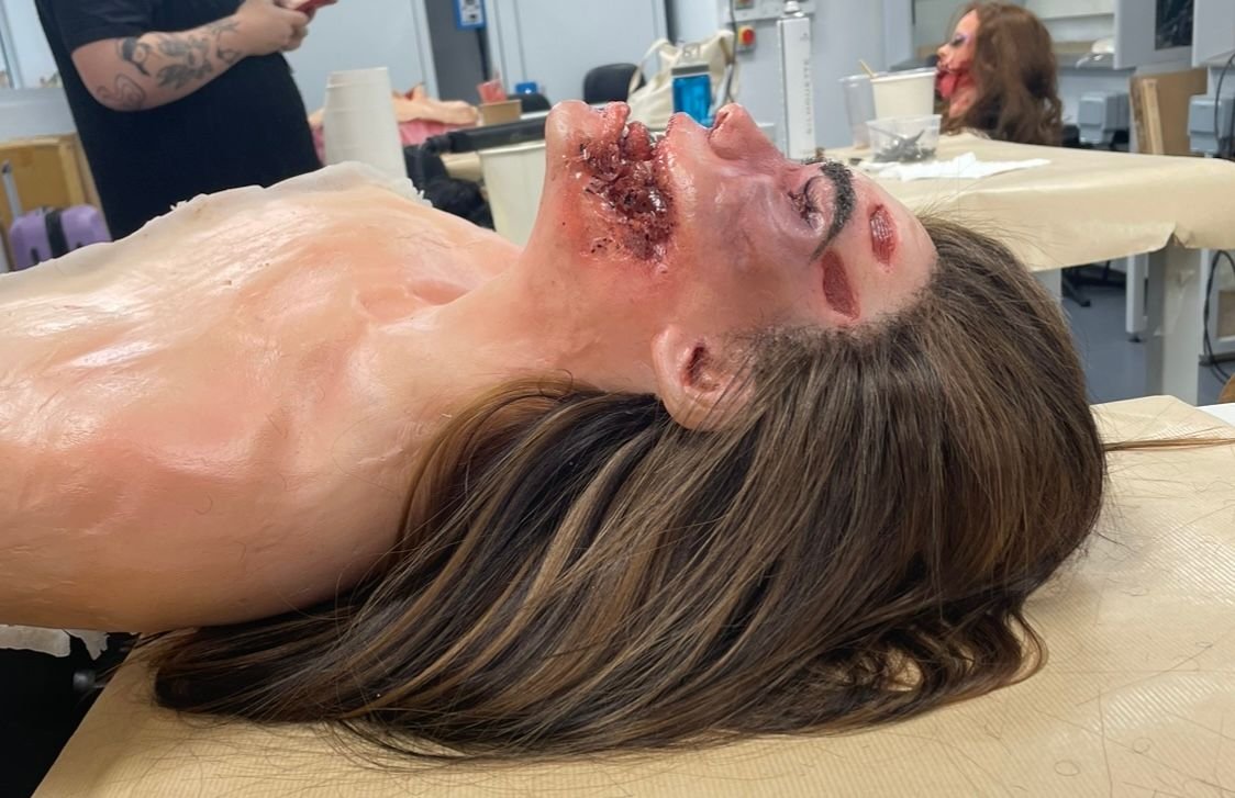 "Aanya" car crash victim. All designing, sculpting, mould-making, silicone casting, hair punching and painting done by Cara Beckett.
(March 2023)