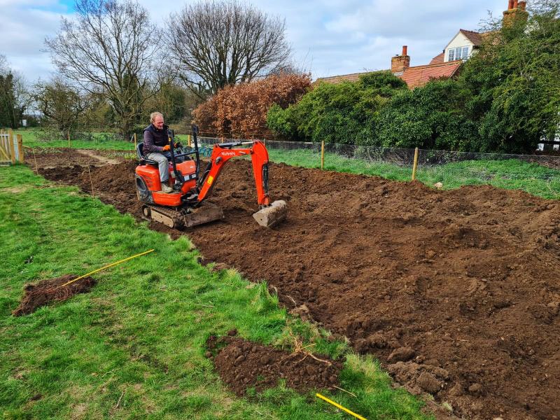 End March 2021 - we needed help and were very grateful to Rob Hughes who worked miracles with his mini digger.