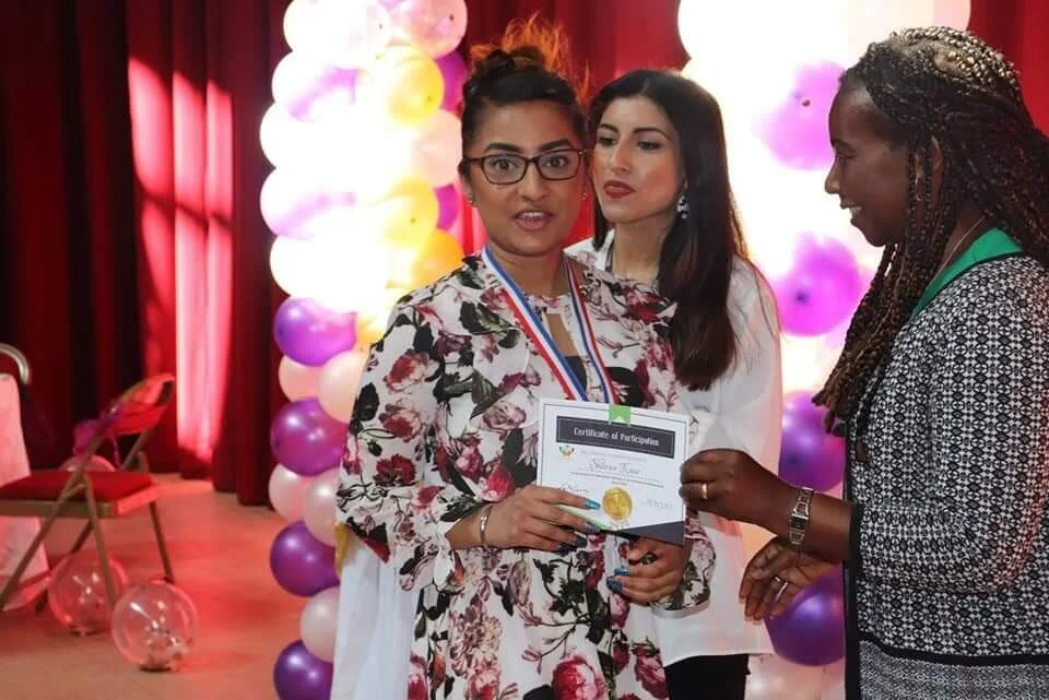 One of our ladies receiving her certificate of Appreciation. On the right is Development Officer for Arboretum Ward Linder Wright) doing us the honours. Behind them is our MC Summaya Mughal ( TV/Radio Presenter-BBC)