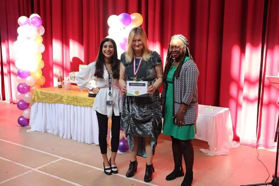 One of our ladies receiving her Certificate of Participation.
