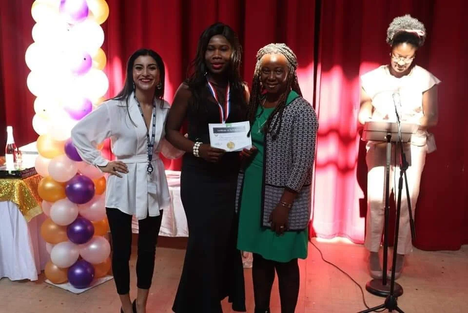 One of our ladies receiving her Certificate of  Participation.