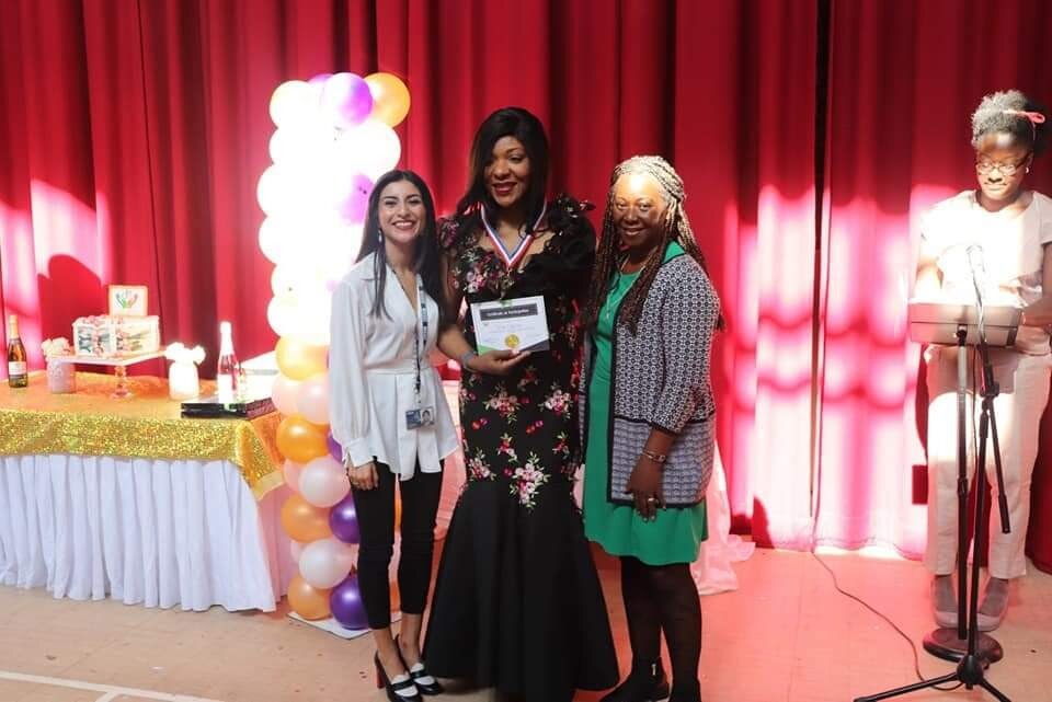 One of our ladies receiving her Certificate of Appreciation.