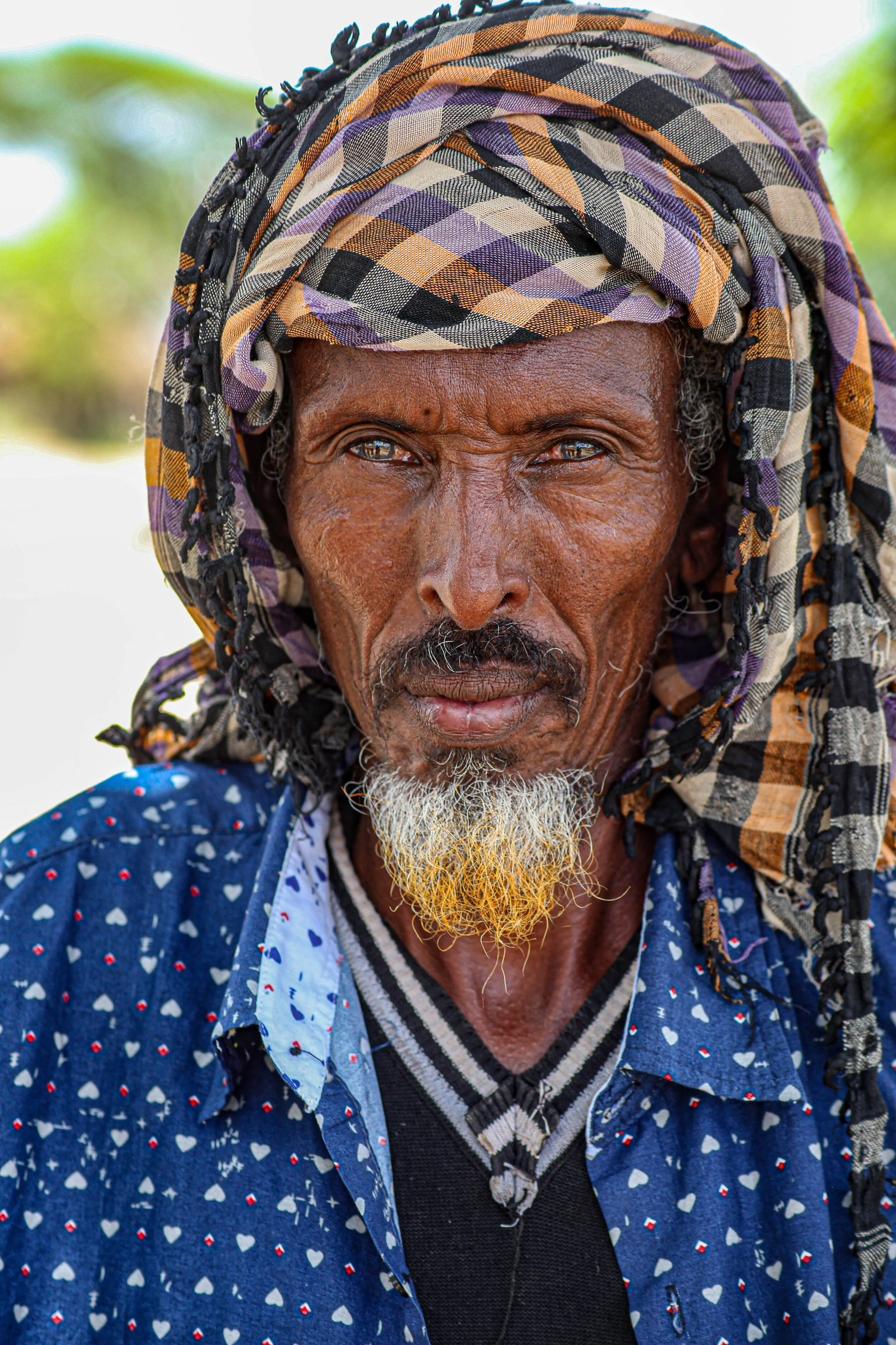 A portrait of a 64 years old named Geele who spent in most of his life herding camels. “ I move with my camel between Kenya, Somalia and Ethiopia in search of water and pasture and i believe pastoralists have no boarder.” Said Geelle. 