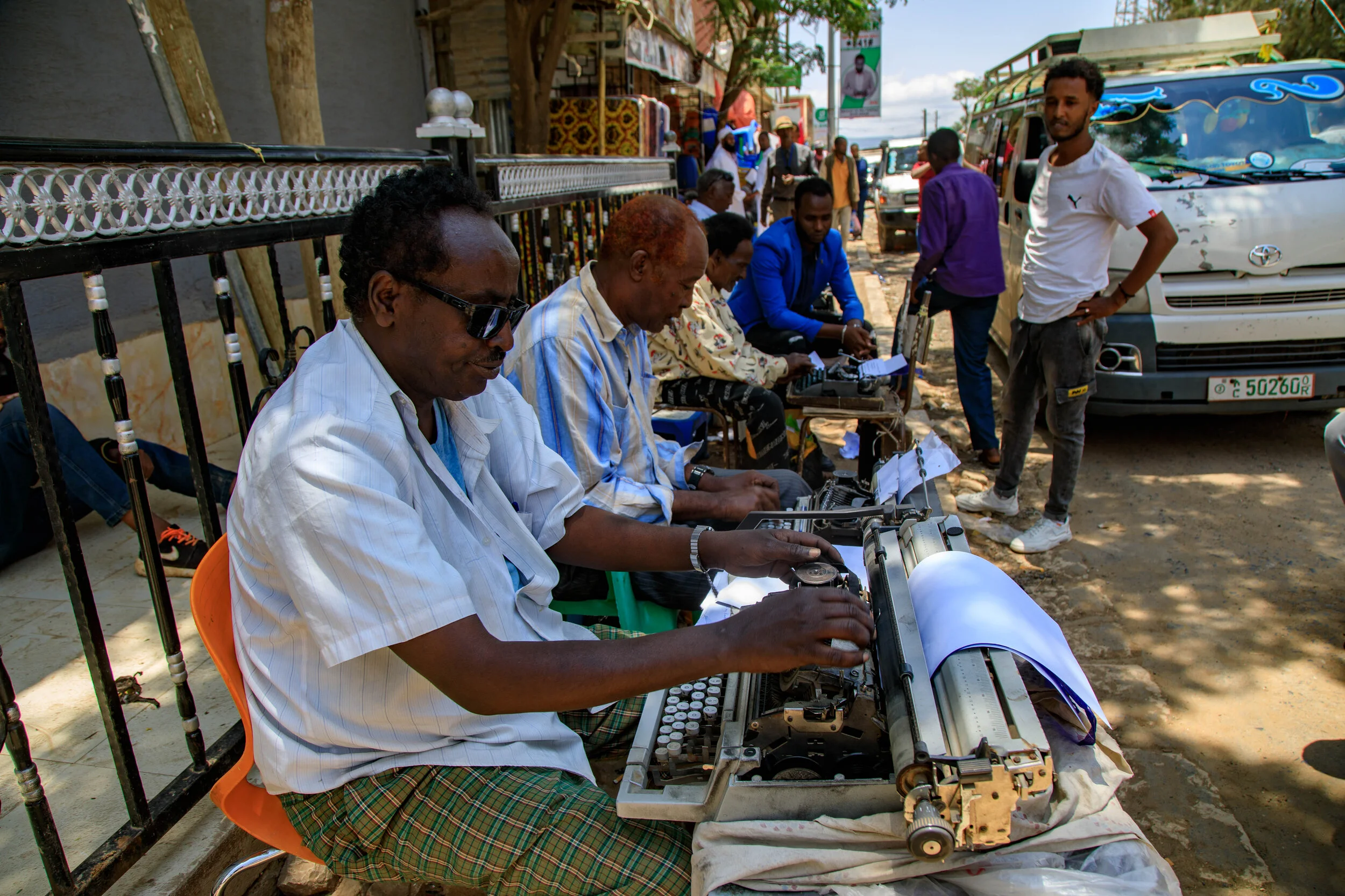 Streets of Jigjiga; Typists on the streets of Jigjiga using old typing machines.