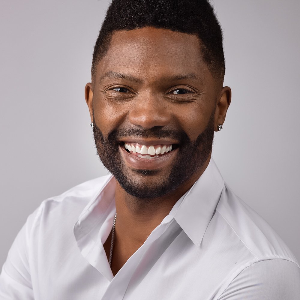 Don Evans Photography in Greensboro NC Professional Headshot of an actor wearing a white shirt during his professional headshot in studio.jpg