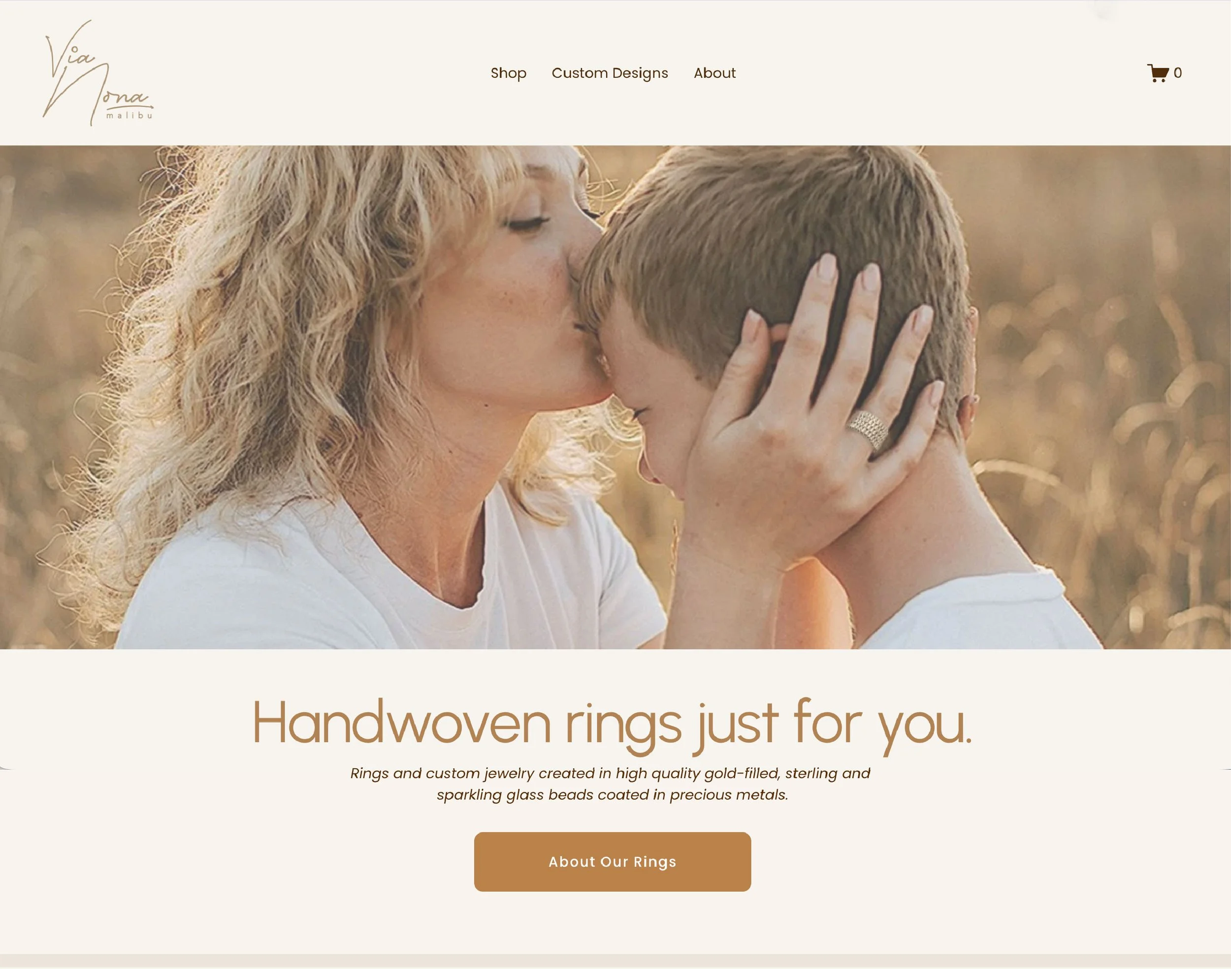 Mom with ring kissing little boy