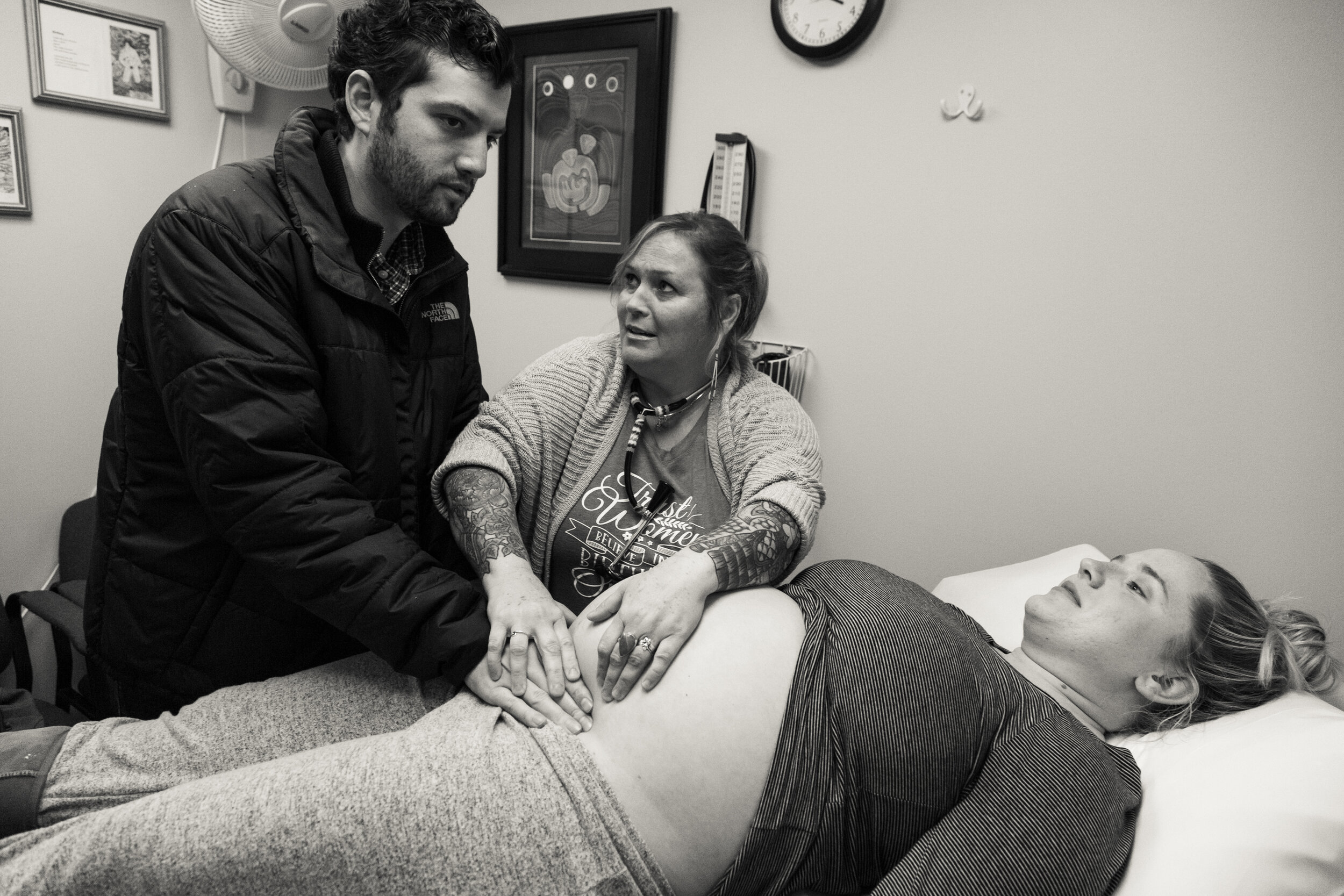 Midwife Belinda Lashea helps Ryan feel the baby while at an appointment at the Women's Birth and Wellness Center on Nov. 12, 2018. Rachel’s family has a history of natural childbirth, which exposed Rachel to the idea of having one herself. “My mom ha