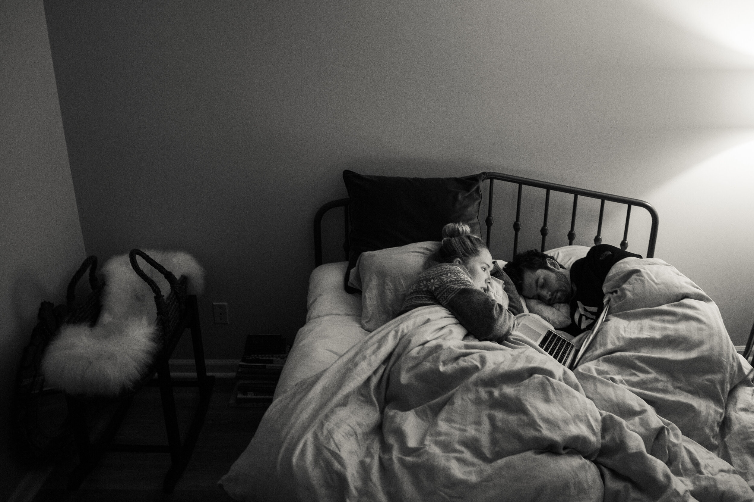 Rachel watches some youtube videos while Ryan falls asleep in her bedroom on Nov. 12, 2018. Rachel has become increasingly tired since she cannot sleep in her favorite sleeping position, on her back, and because the baby keeps her up at night. "The b