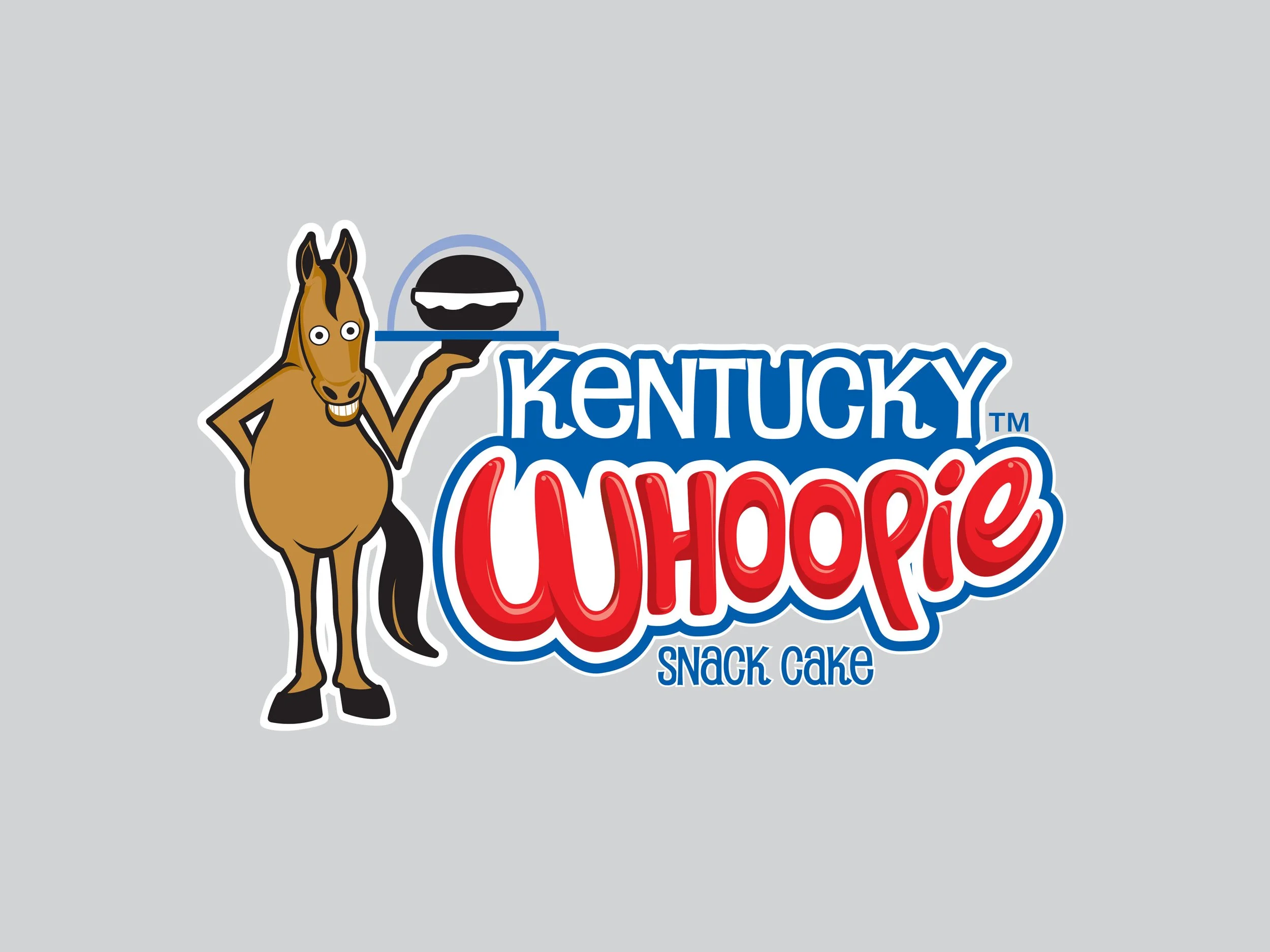 Logo for Kentucky Whoopie Snack Cake featuring a cartoon horse holding a black snack cake, with bold blue, red, and white text.